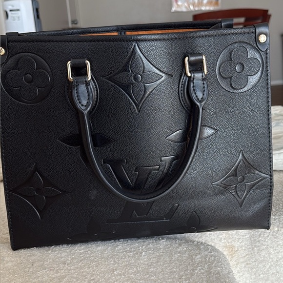 Black Louis Vuitton Embossed Handbag - Picture 1 of 5